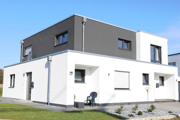 Modern designed single-family house under construction in Borgholzhausen, Westphalia, Germany, 04-27-2021; Shutterstock ID 1964846407; purchase_order: PTRF-2210035 ; job: ; client: Triflex; other: Yasmin Neshatrooh